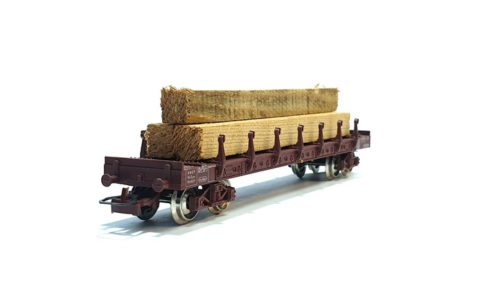WAGON PLAT A TRANSPORT DE BOIS N°194921 SNCF SOUS CELLOPHANE