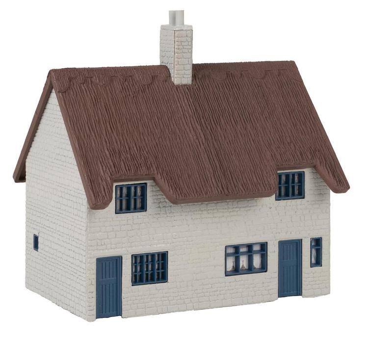 MAISON D'HABITATION AVEC TOIT DE CHAUME